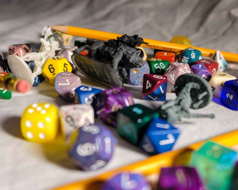 Dice, miniatures and pencils with which to play a tabletop RPG.