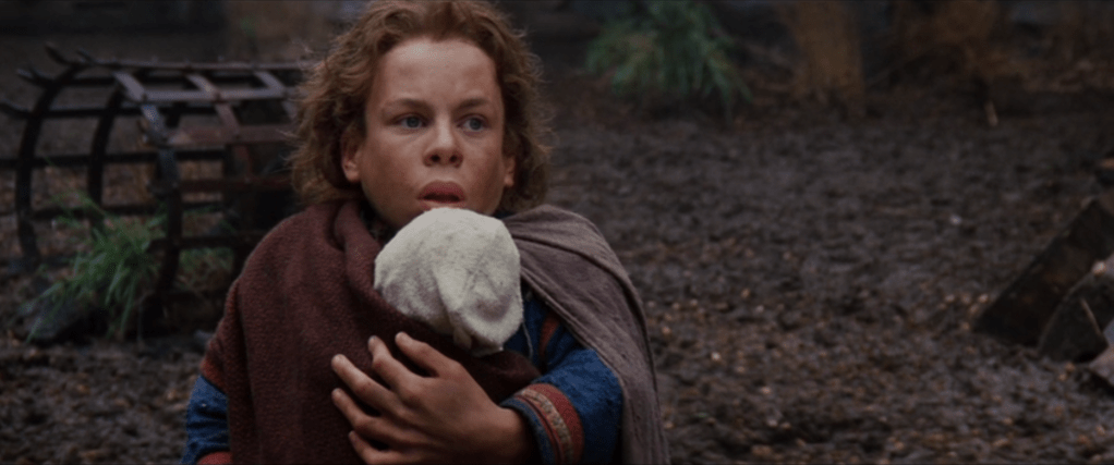 A scene from "Willow", Willow with the plot-significant magic baby.