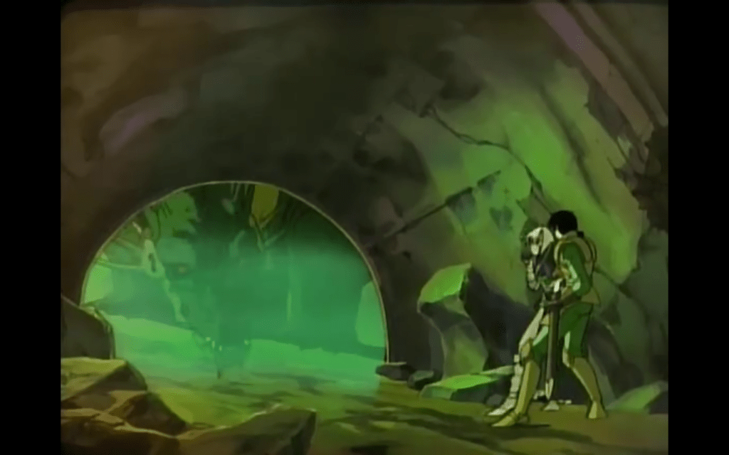 A still from "Record of Lodoss War." Parn and Deedlit hiding from a green Dragon.