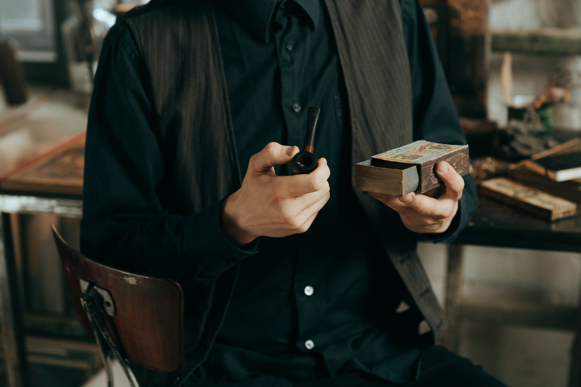A man smoking a pipe.