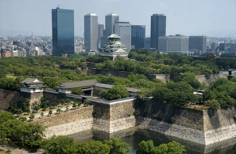 The skyline of Osaka, prominently featuring Osaka castle.
