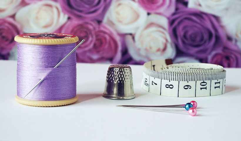Various sewing materials with a purple and white colour palette.