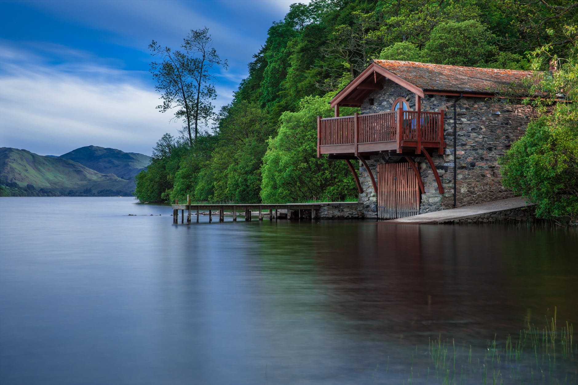 A waterfront stone cottage.