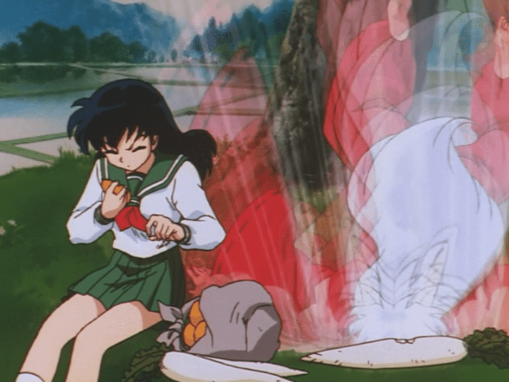 Inuyasha falling out of a tree.