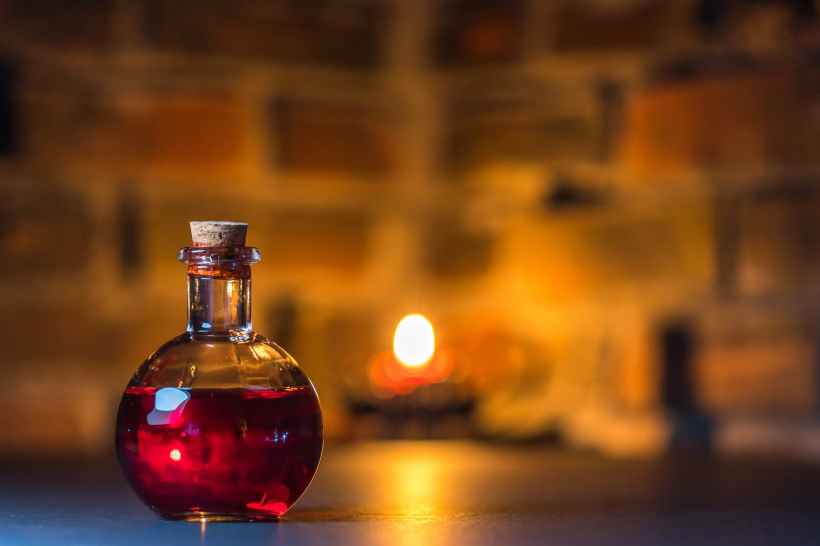 A red potion in a flask.