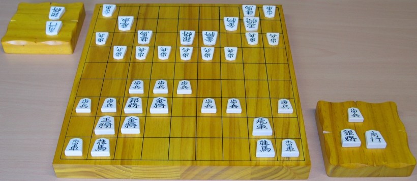 A shogi board and pieces.