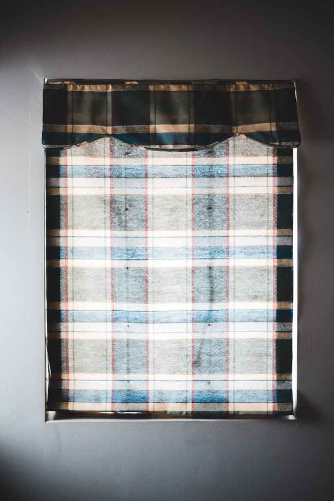 A plaid curtain.