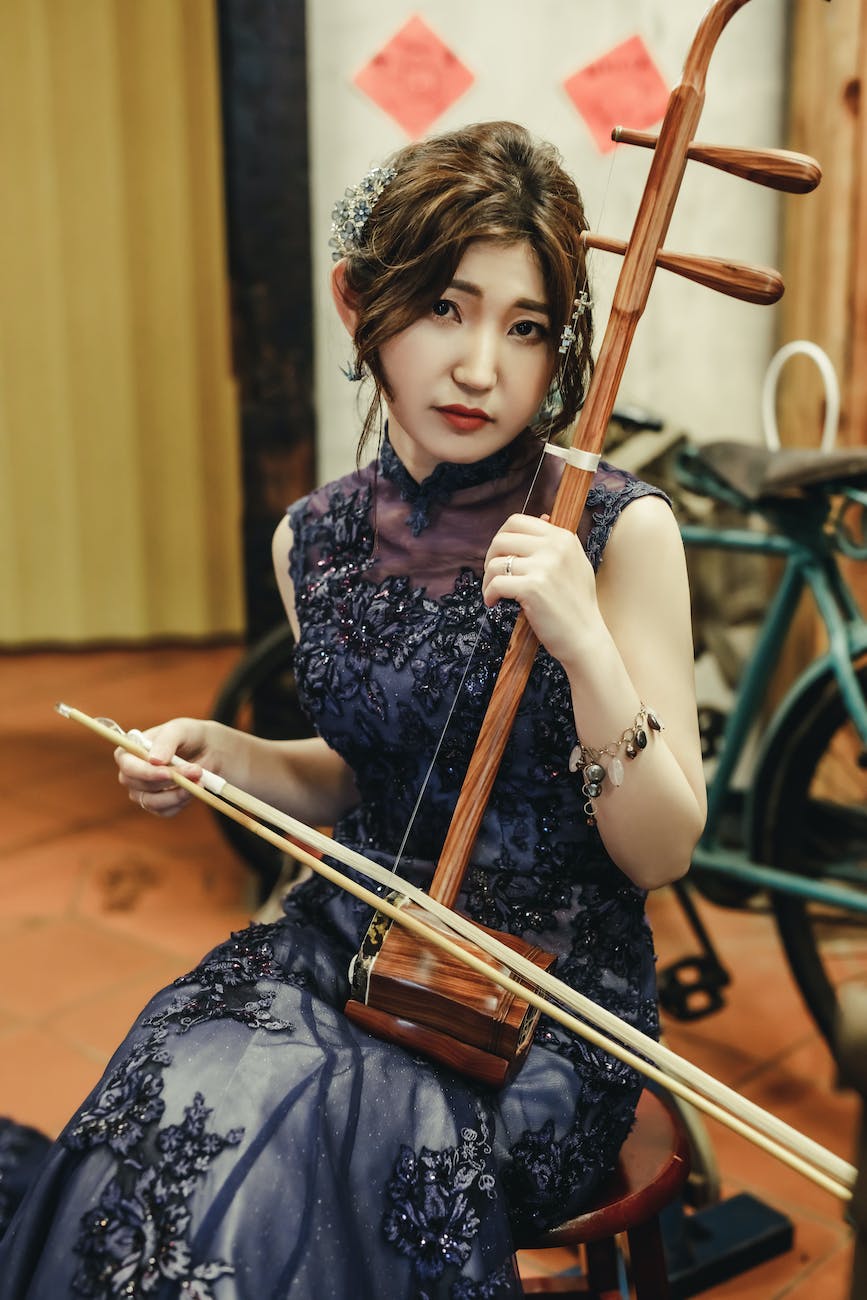 A woman with an erhu.