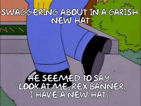 A scene from The Simpsons, featuring Homer with a new hat and the caption: 'Swaggering about in a garish new hat, he seemed to say "Look at me, Rex Banner, I have a new hat."'