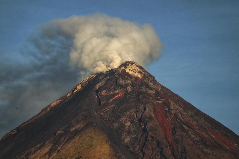 A volcano with an ash plume.