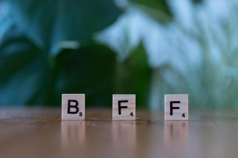 Scrabble tiles spelling out BFF.