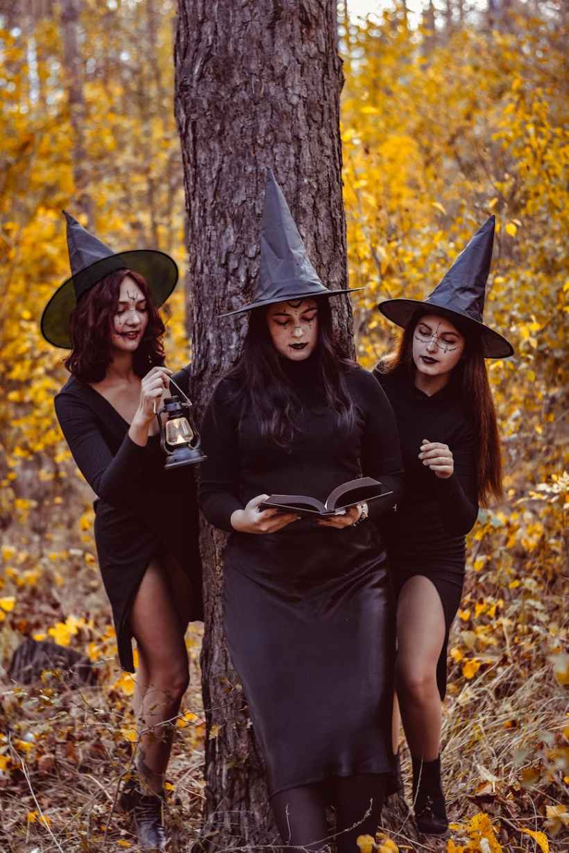 Three women dressed as witches.