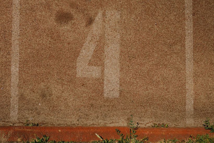 The number 4 on a racetrack lane.